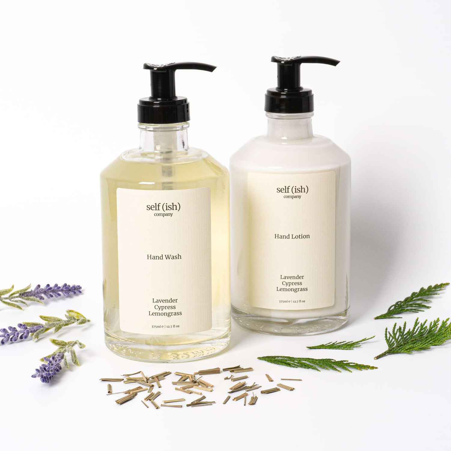 hand wash and hand lotion with essential oils and hemp seed oil in clear glass bottle and black plastic pump