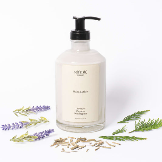 hand lotion with lavender cypress and lemongrass essential oils and unrefined hemp seed oil with a 375ml premium glass bottle black pump and minimalist label