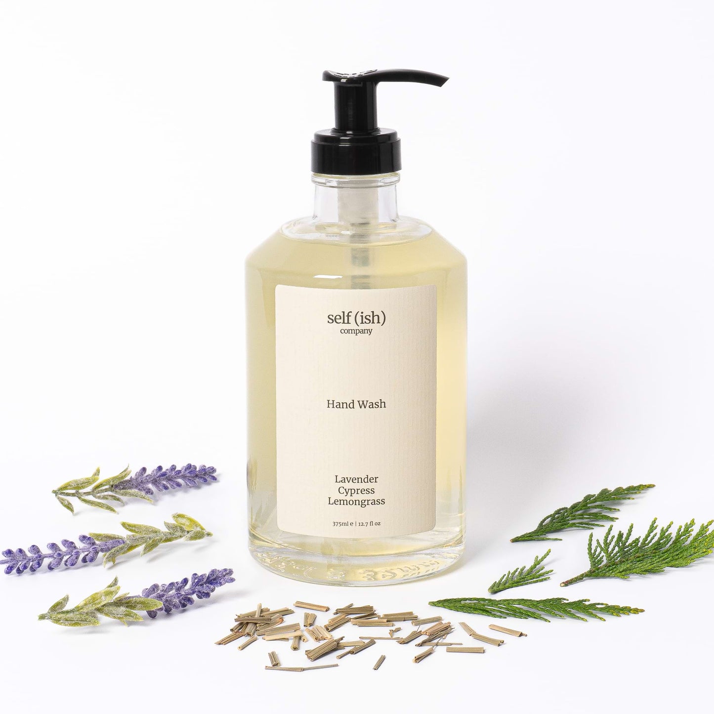liquid hand soap with lavender cypress and lemongrass essential oils and unrefined hemp seed oil with a 375ml premium glass bottle black pump and minimalist label