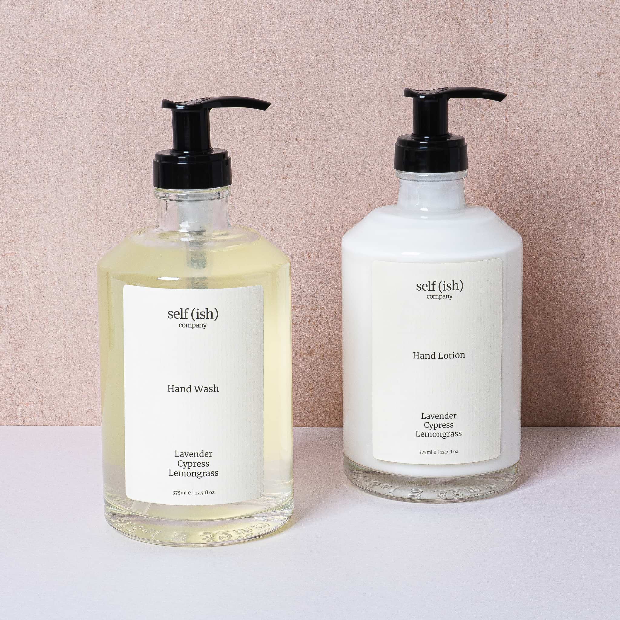 hand wash and hand lotion set with essential oil fragrances of lavender, cypress and lemongrass. Luxury glass bottle and pump dispenser