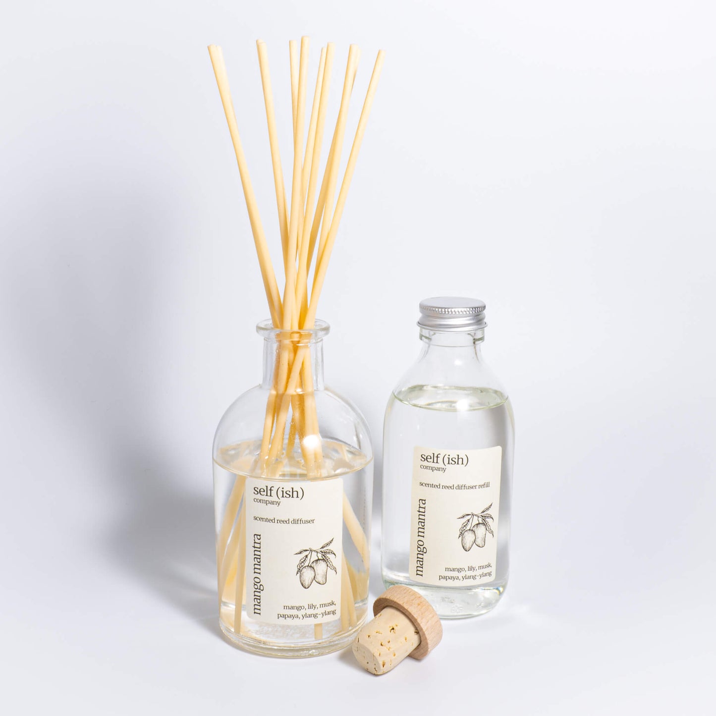 200ml mango scented reed diffuser refill in clear glass bottle with aluminium lid