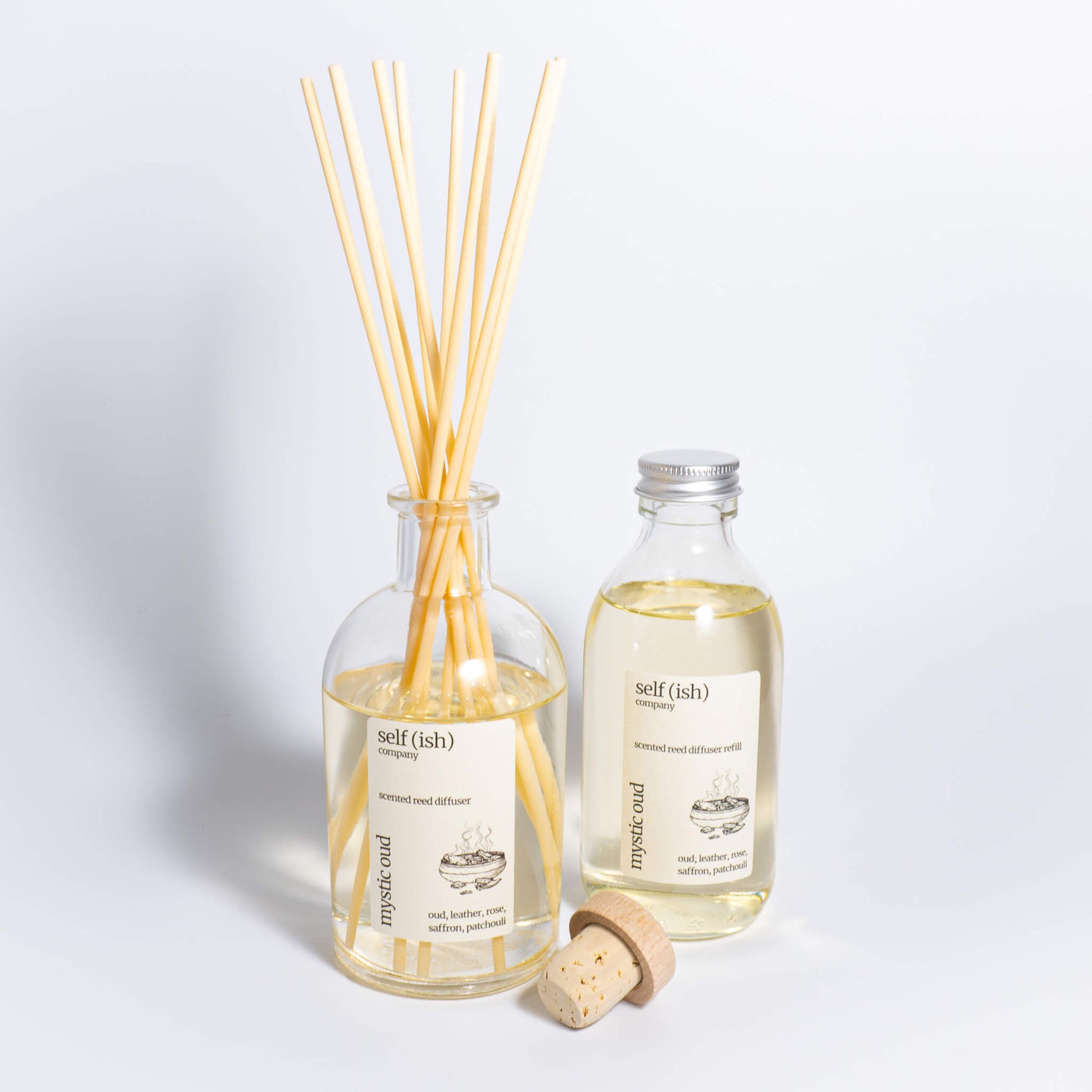 200ml oud scented reed diffuser refill in clear glass bottle with aluminium lid