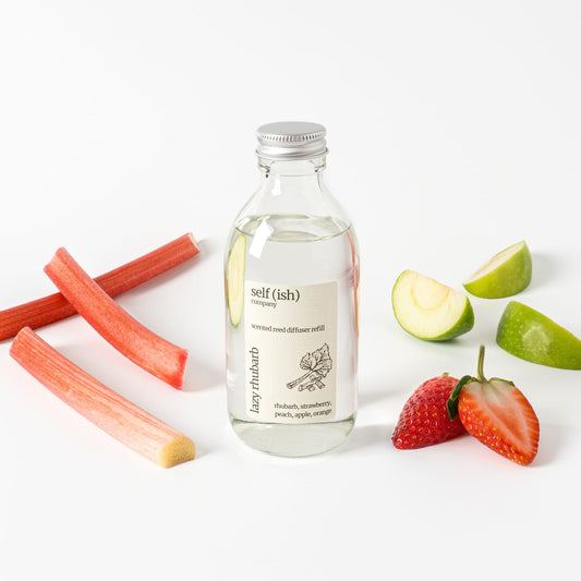 200ml rhubarb reed diffuser refill surrounded by fresh fruits