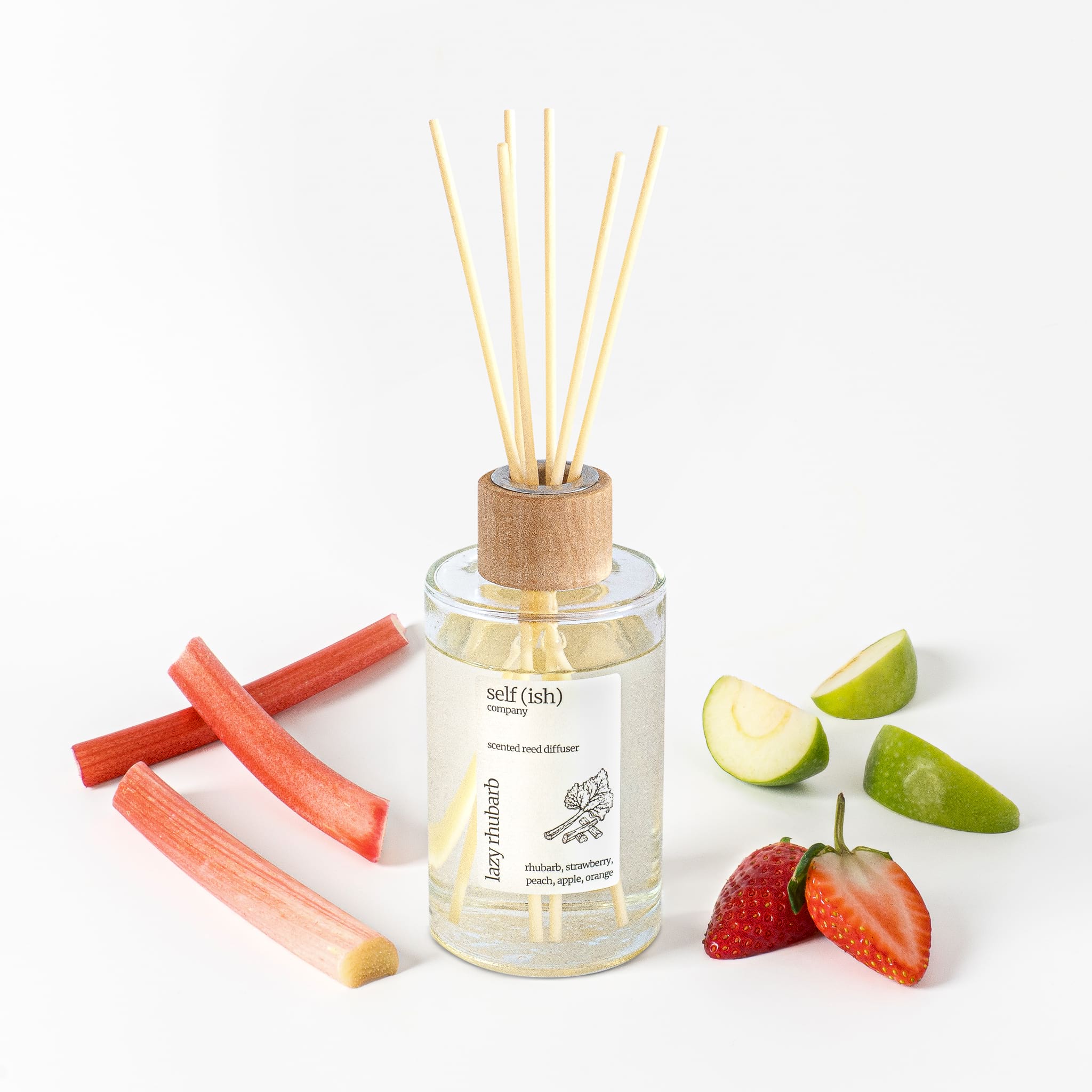 rhubarb reed diffuser with strawberry and apple with white background