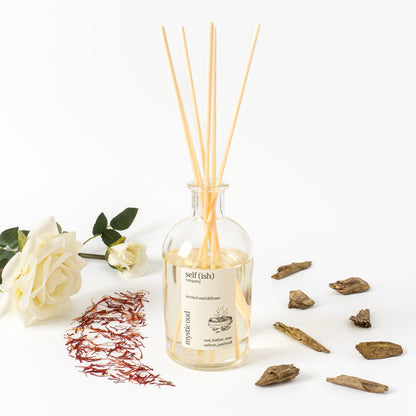 200ml scented oud reed diffuser in a stylish clear glass bottle and a wooden cork bamnboo lid