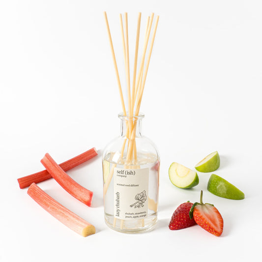 200ml scented rhubarb reed diffuser in a stylish clear glass bottle and a wooden cork bamnboo lid